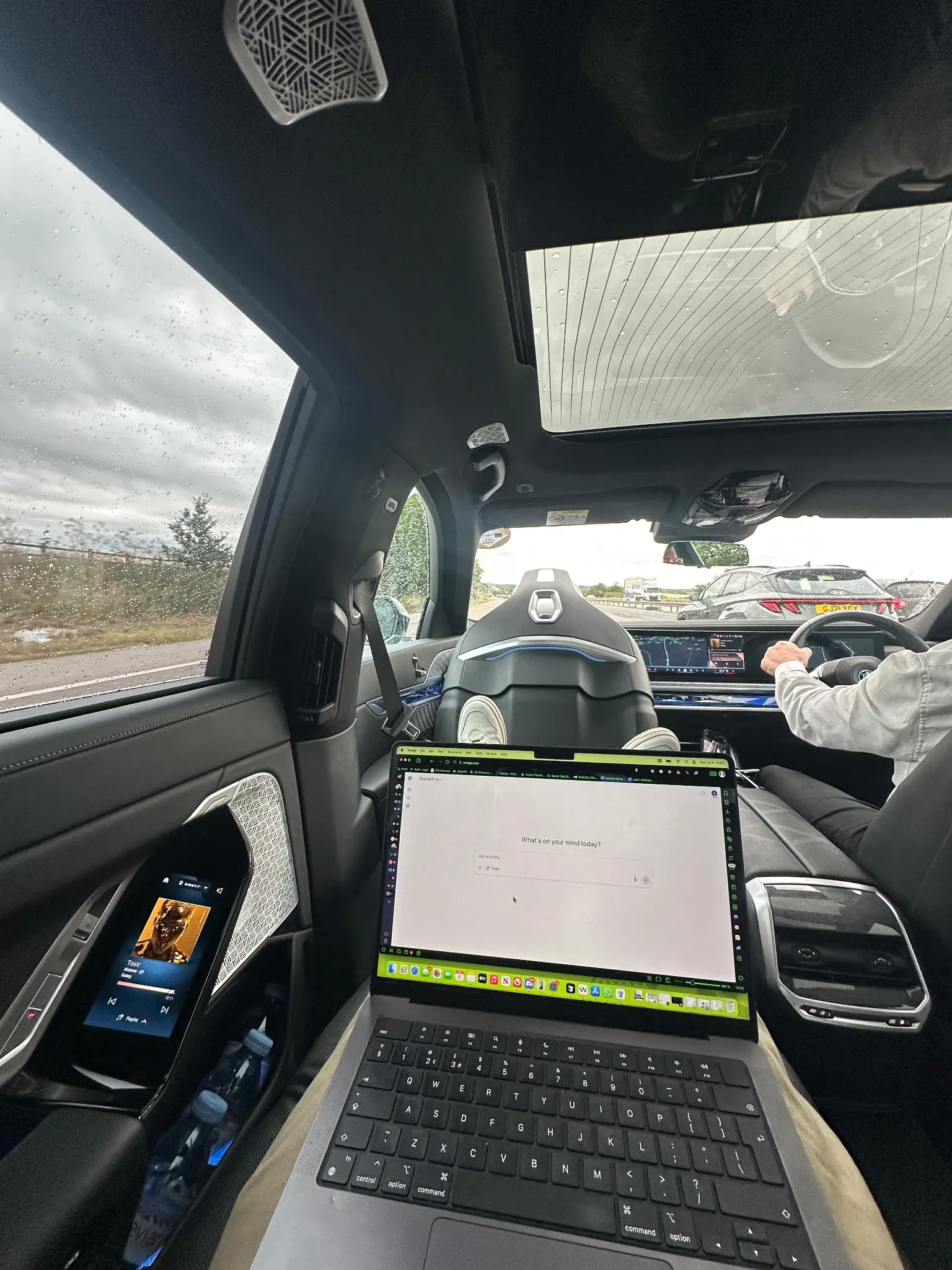 Rear seat view with entertainment and productivity setup