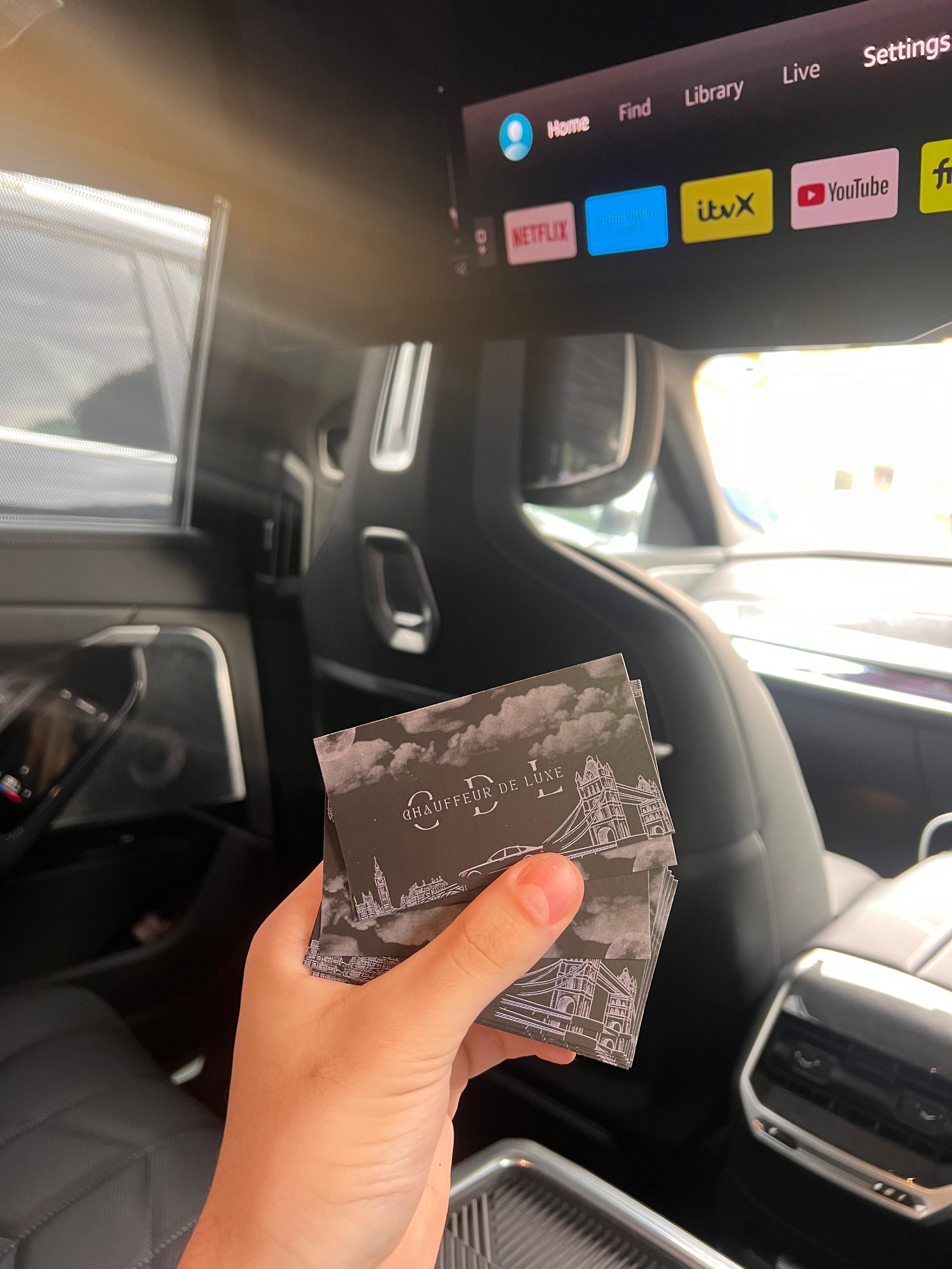 Chauffeur De Luxe business cards in luxury BMW interior
